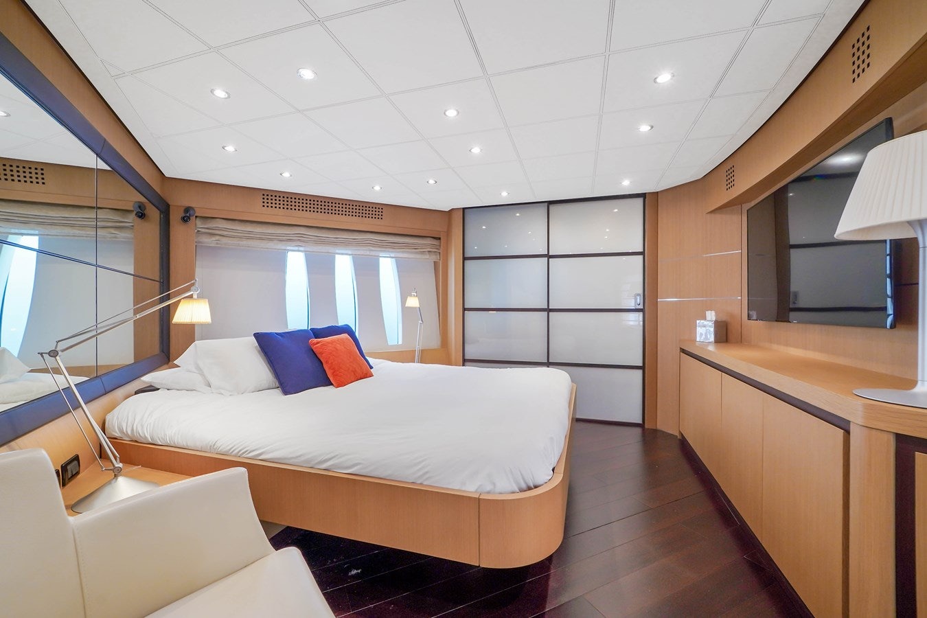 a room with a bed and a window aboard SHADOW Yacht for Sale