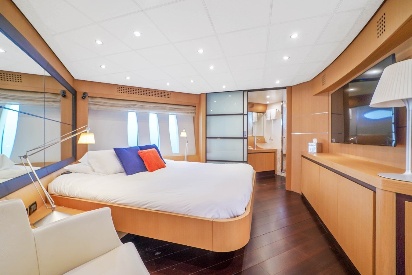 a room with a bed and a window aboard SHADOW Yacht for Sale