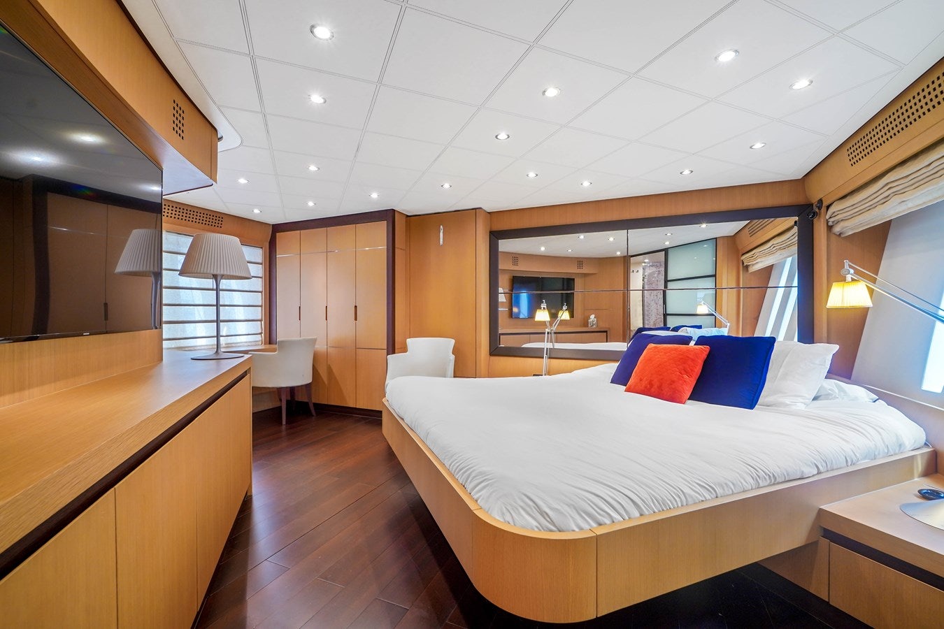 a large bedroom with a large bed aboard SHADOW Yacht for Sale