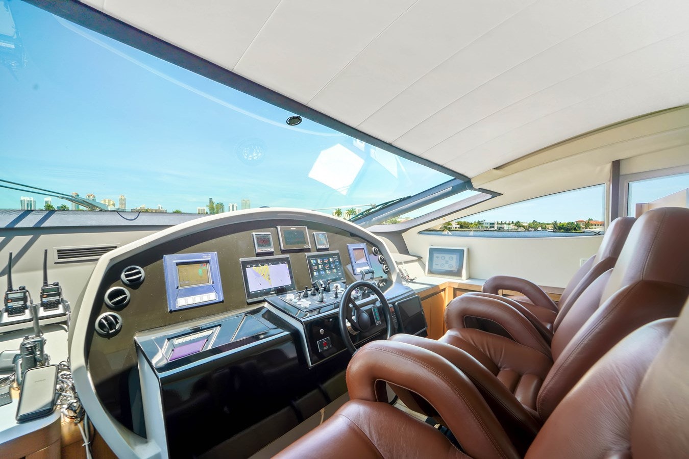 a person driving a car aboard SHADOW Yacht for Sale