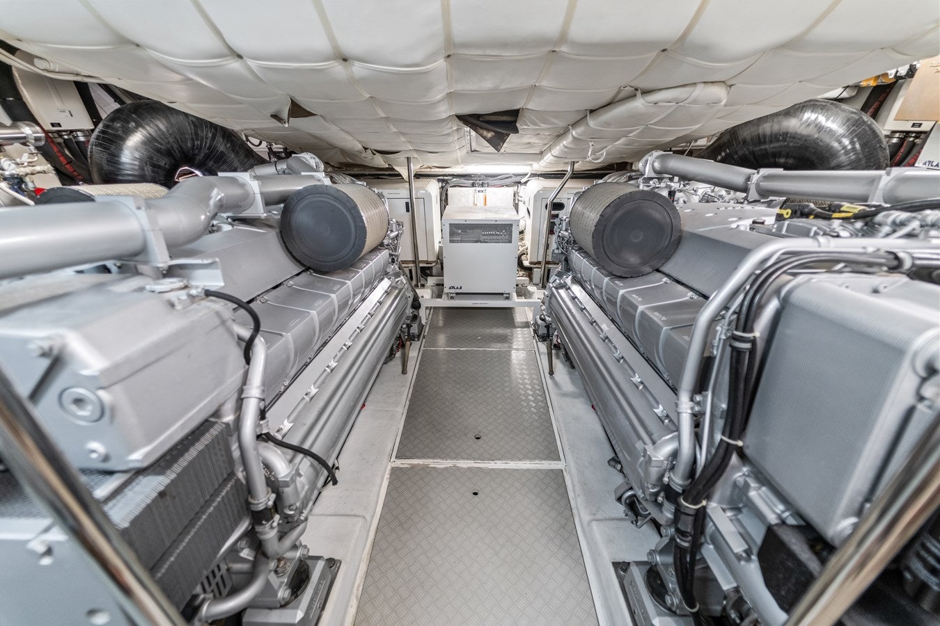 a large room with large machines aboard SHADOW Yacht for Sale