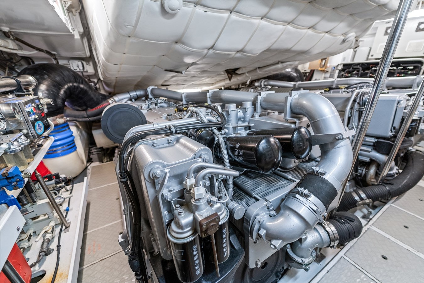a car engine with a blue bucket aboard SHADOW Yacht for Sale