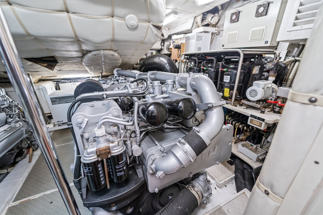 a car engine in a garage aboard SHADOW Yacht for Sale