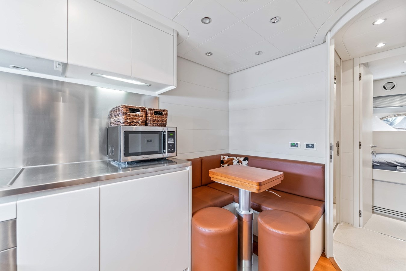 a kitchen with a microwave oven and a microwave aboard SHADOW Yacht for Sale