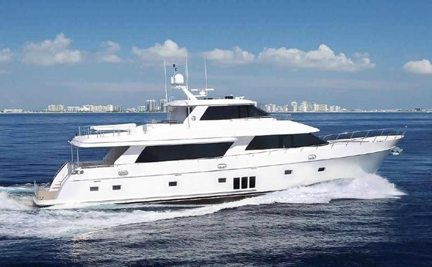 a white yacht on the water aboard ONE SHOT Yacht for Sale
