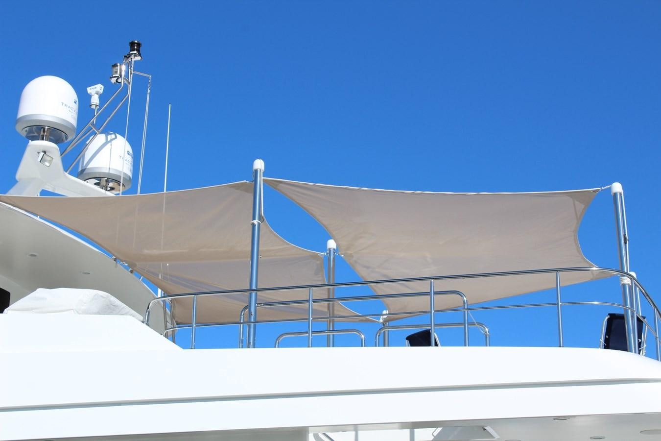 a white boat with white sails aboard ONE SHOT Yacht for Sale