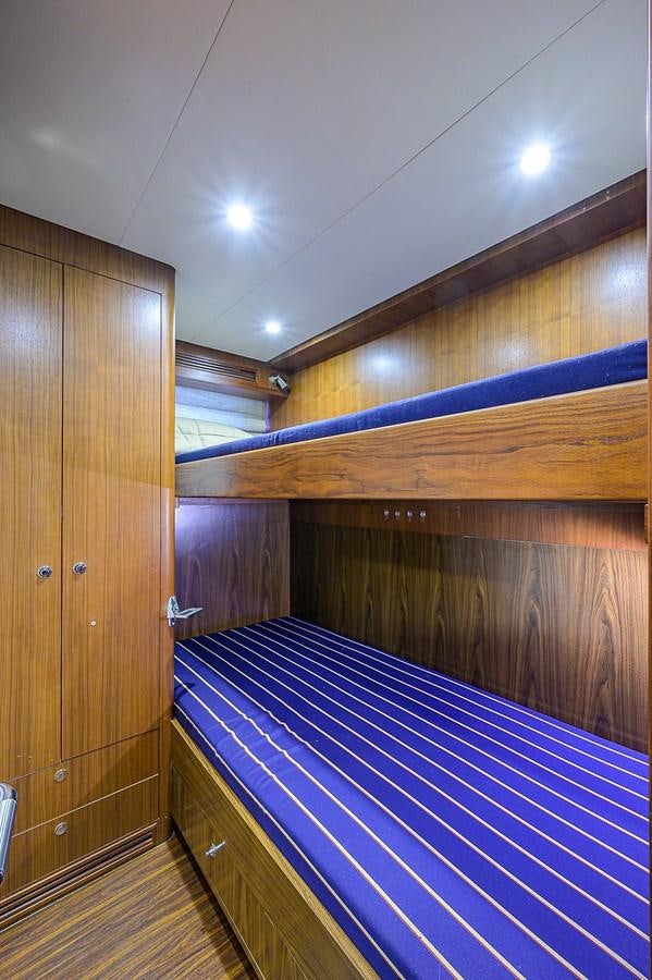 a wood wall with a wood door aboard ONE SHOT Yacht for Sale
