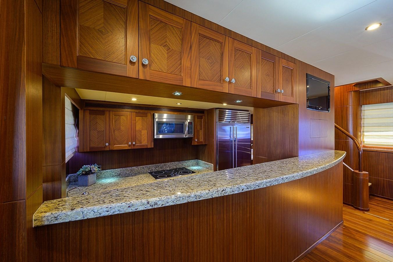a kitchen with granite counter tops aboard ONE SHOT Yacht for Sale