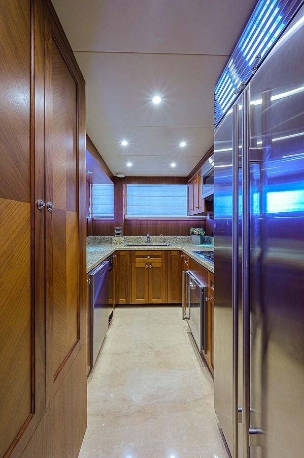 a large kitchen with a large glass shower unit aboard ONE SHOT Yacht for Sale