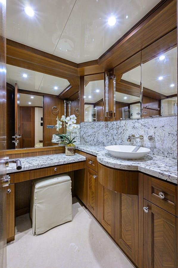 a bathroom with a large mirror aboard ONE SHOT Yacht for Sale