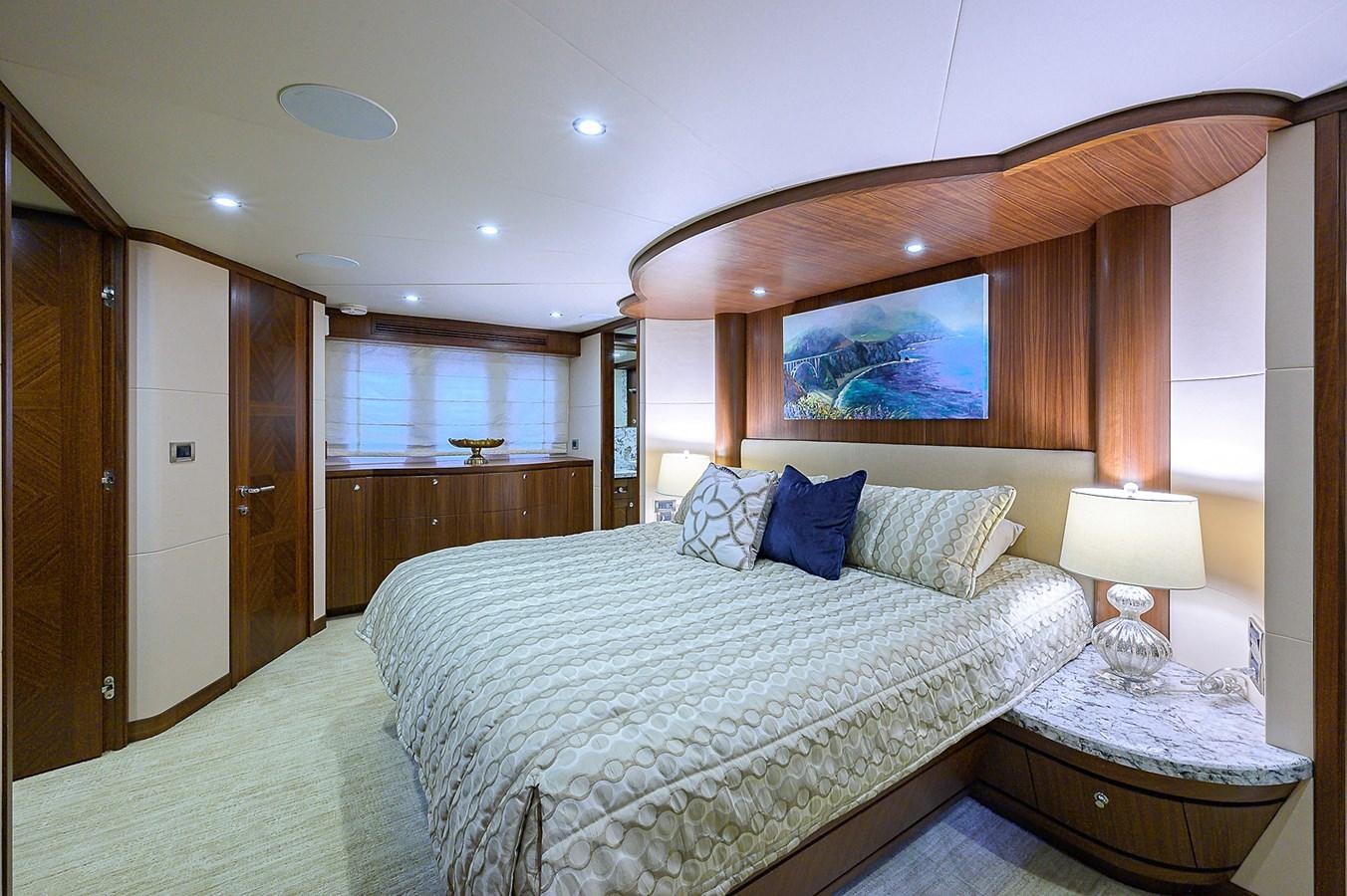 a large bedroom with a large bed aboard ONE SHOT Yacht for Sale
