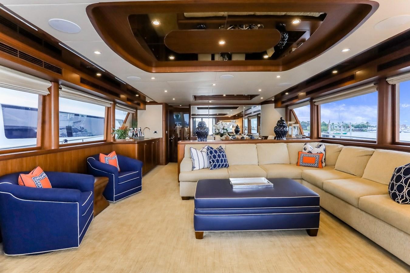 a living room with a couch and a table aboard ONE SHOT Yacht for Sale