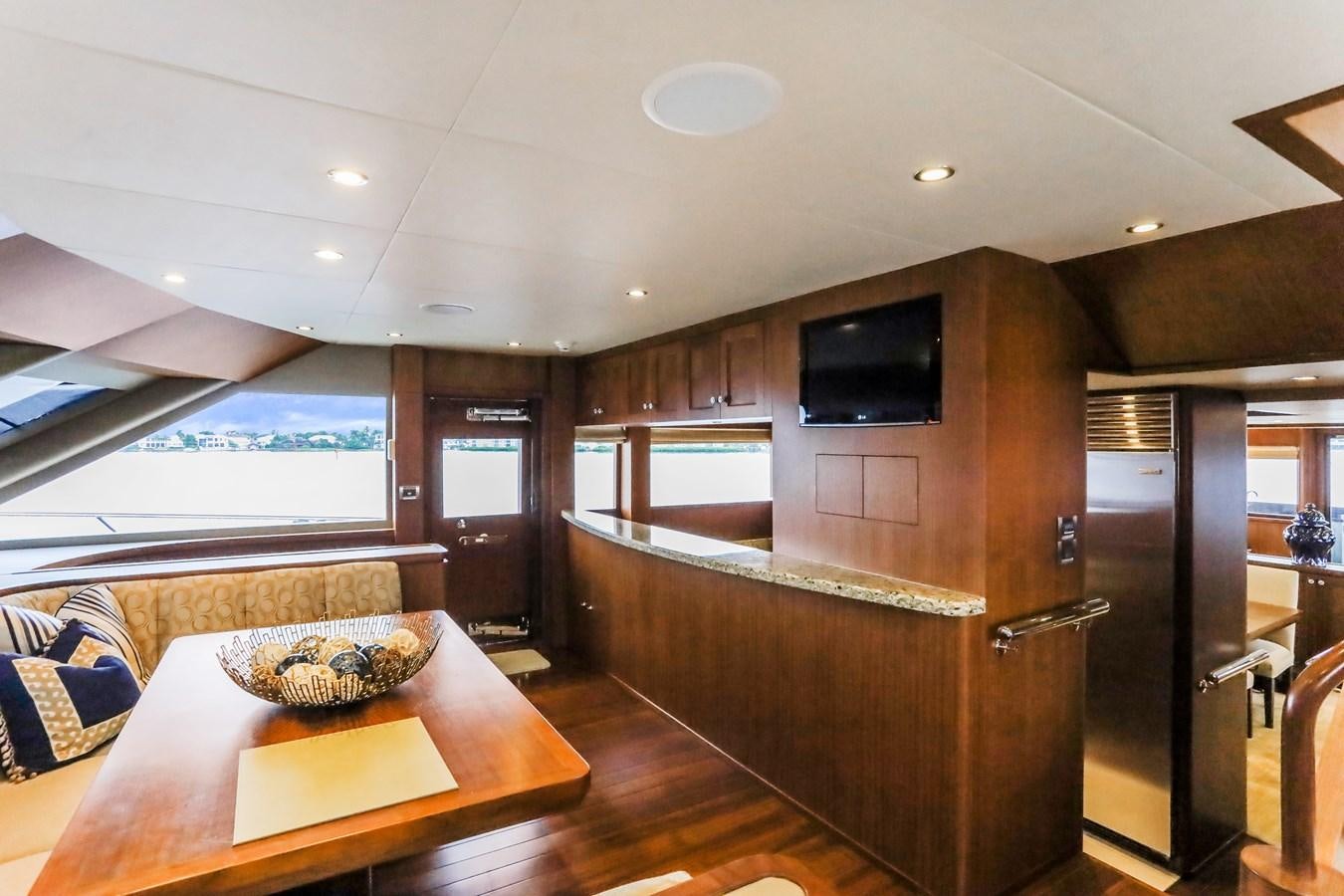 a kitchen and living room area aboard ONE SHOT Yacht for Sale