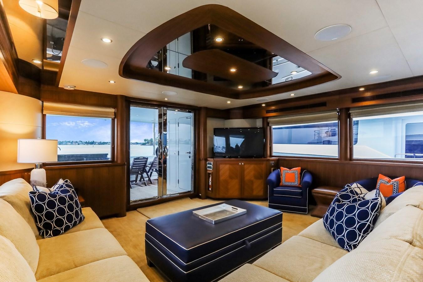 a living room with a large window aboard ONE SHOT Yacht for Sale