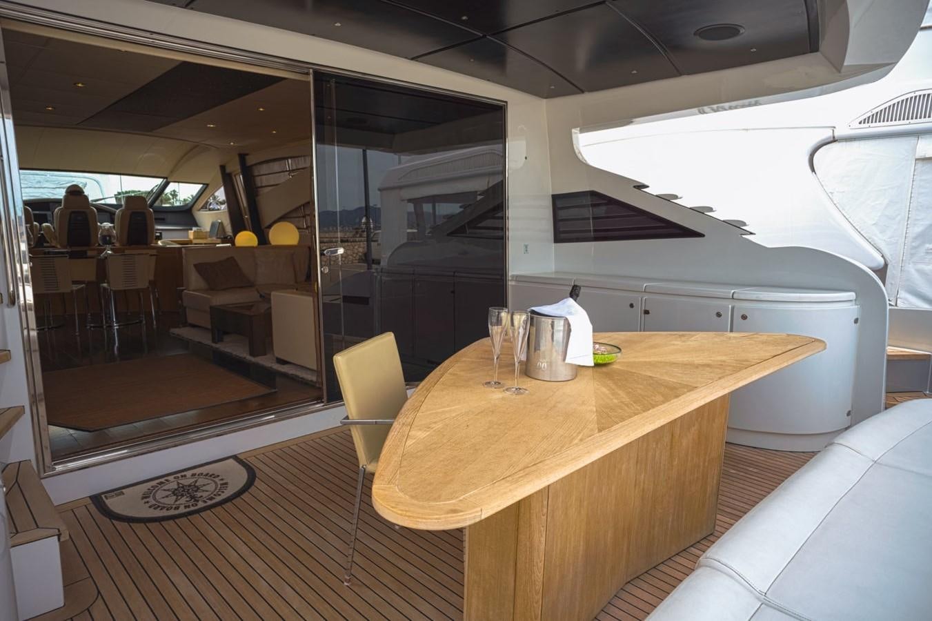 a dining room with a table aboard A&O Yacht for Sale