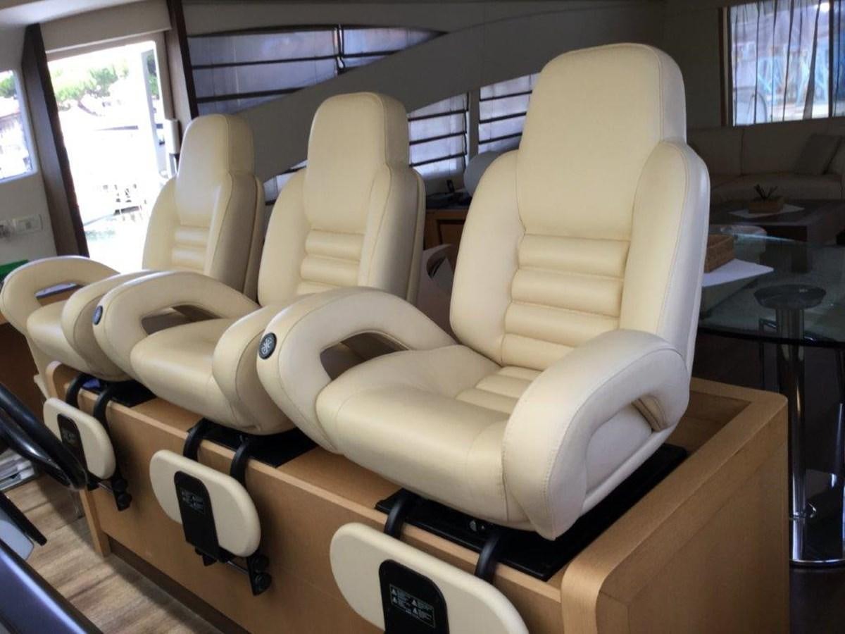 a room with a large chair aboard A&O Yacht for Sale