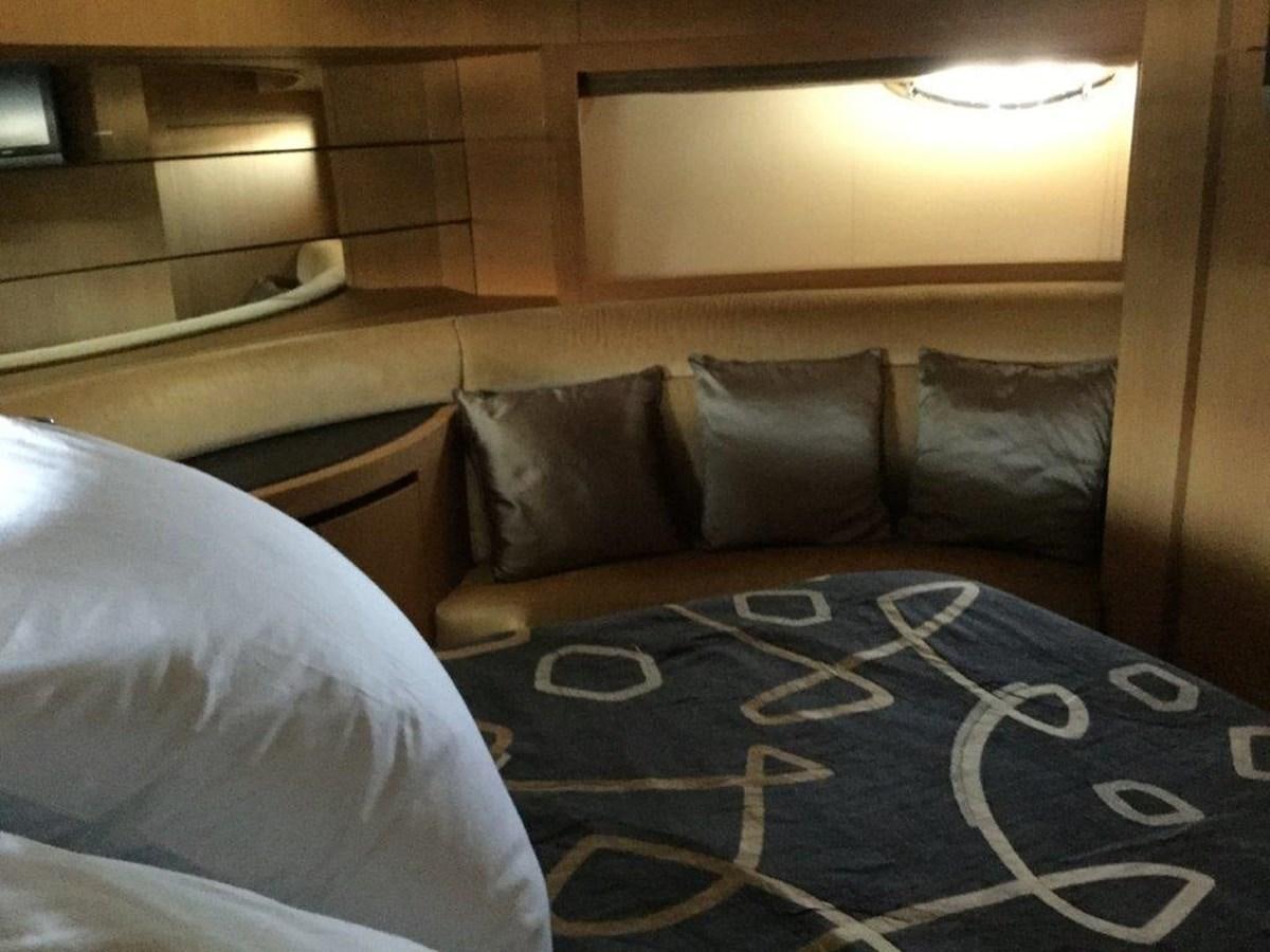 a bed with pillows aboard A&O Yacht for Sale
