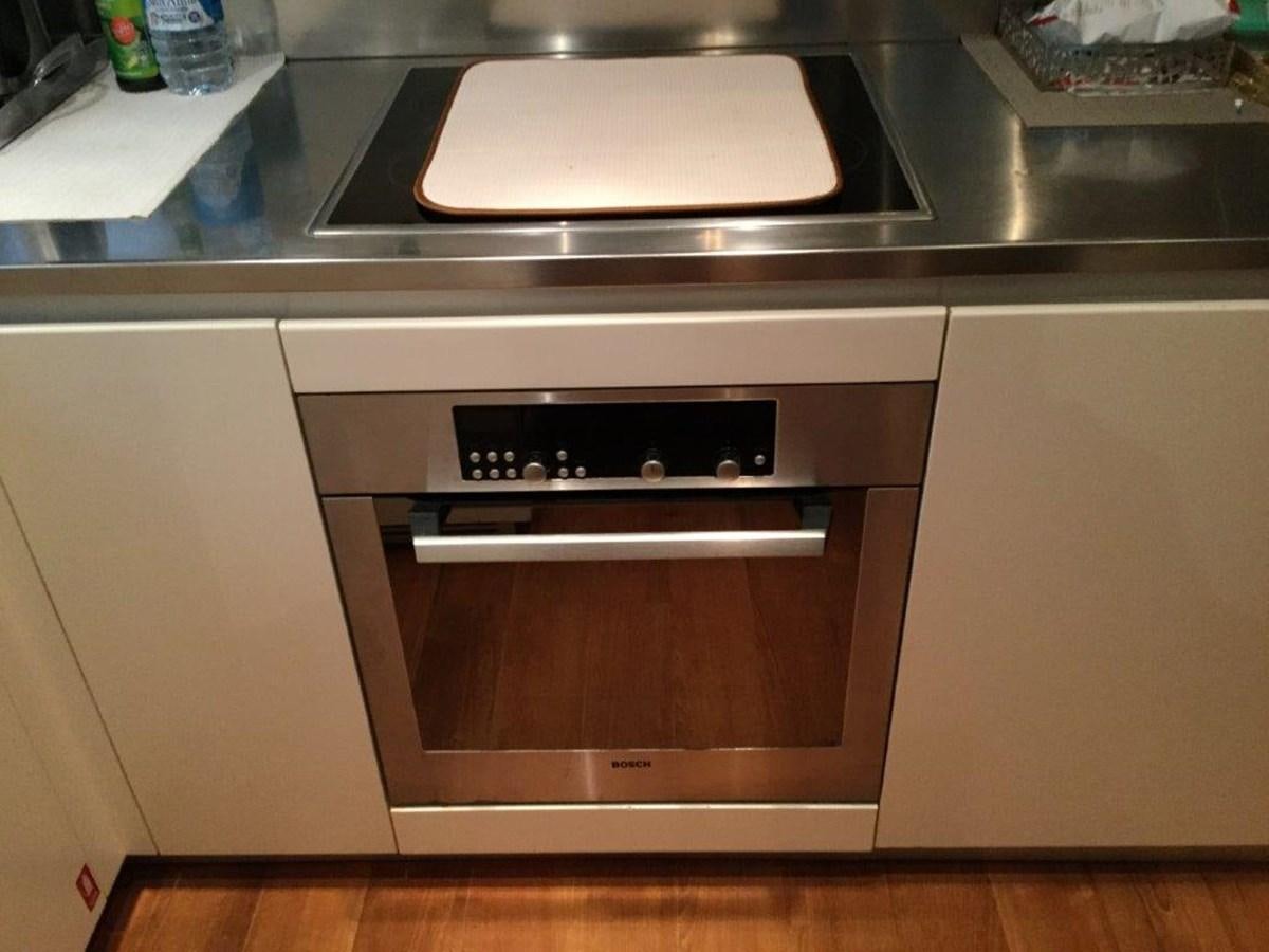 a kitchen with a stove aboard A&O Yacht for Sale