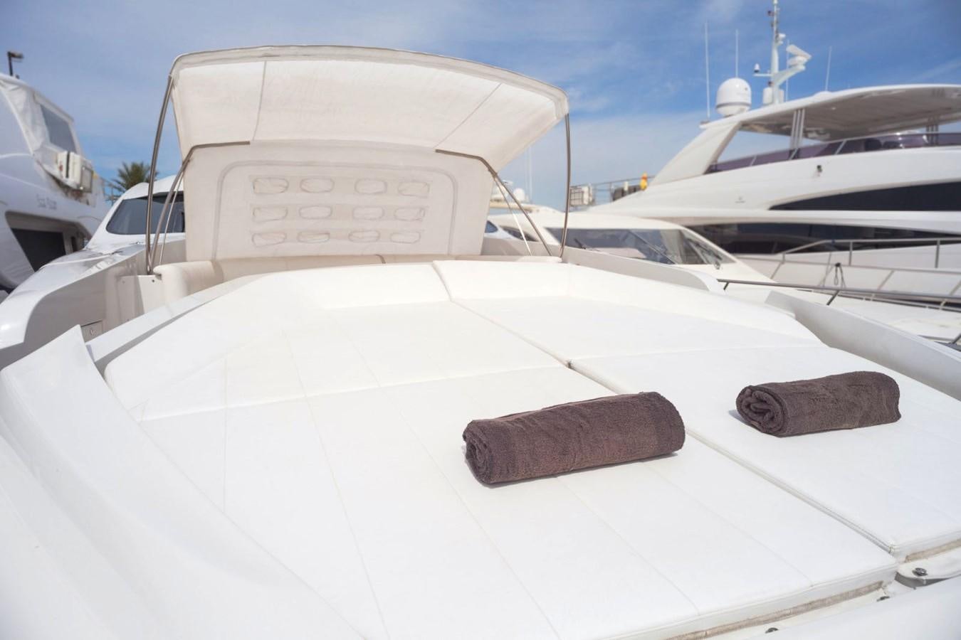 the front of a white car aboard A&O Yacht for Sale