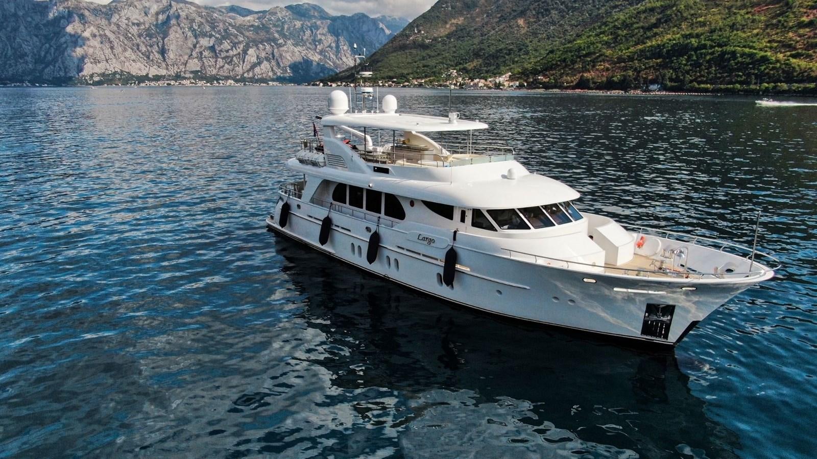a white yacht in the water aboard LARGO Yacht for Sale