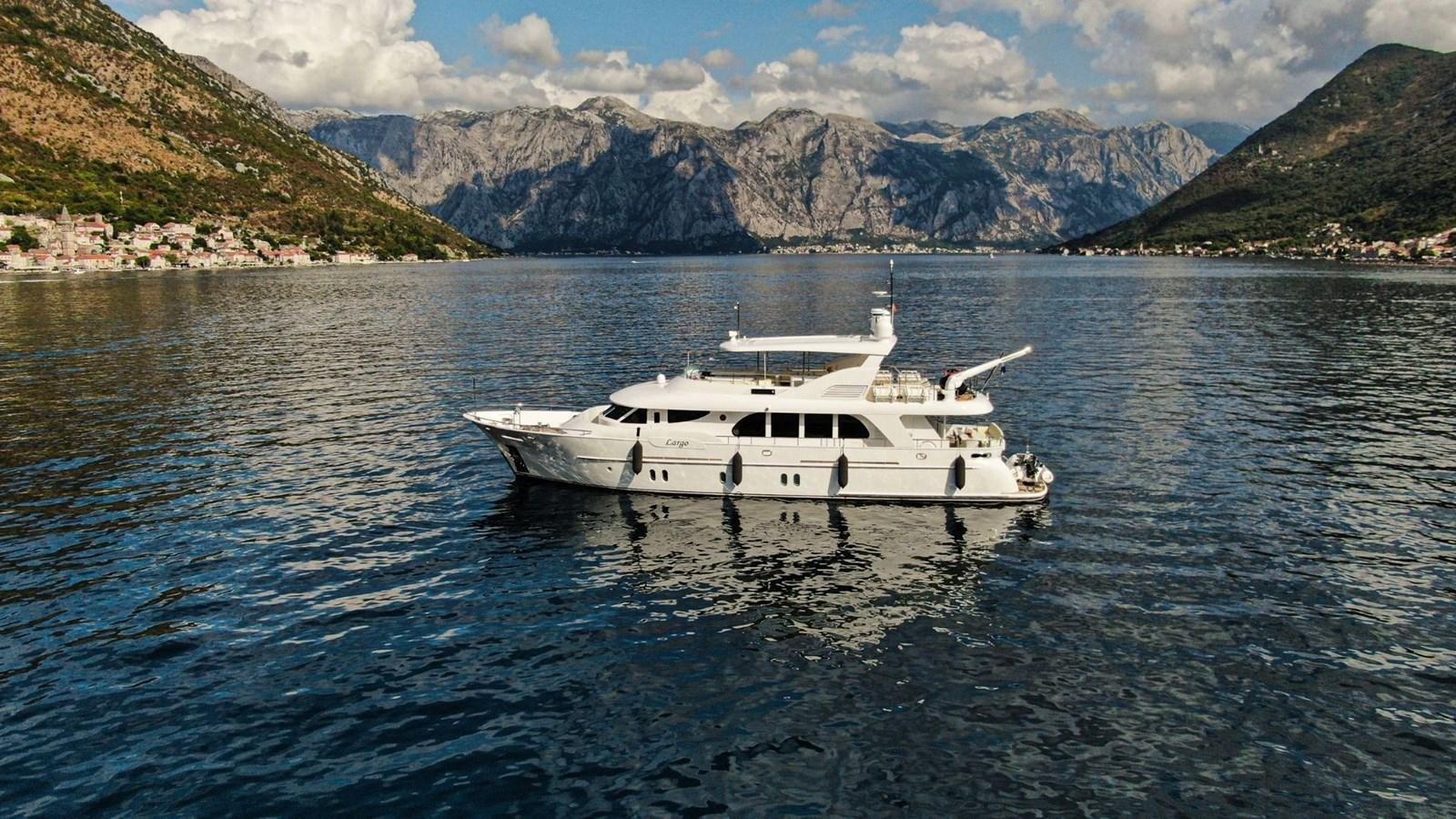 a white boat in the water aboard LARGO Yacht for Sale