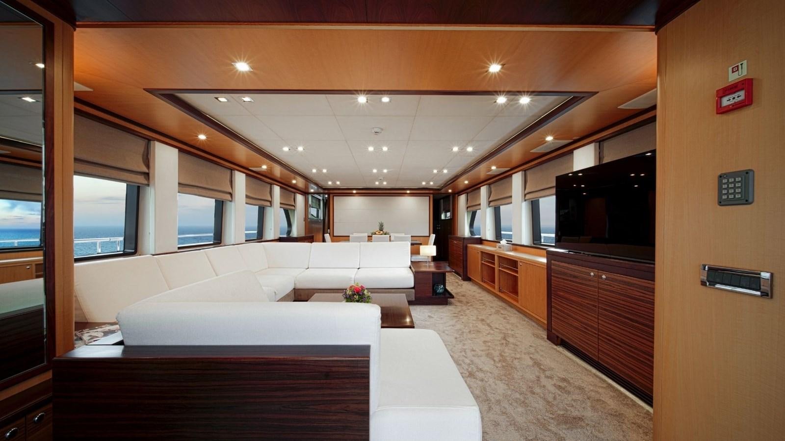 a room with a bed and a tv aboard LARGO Yacht for Sale
