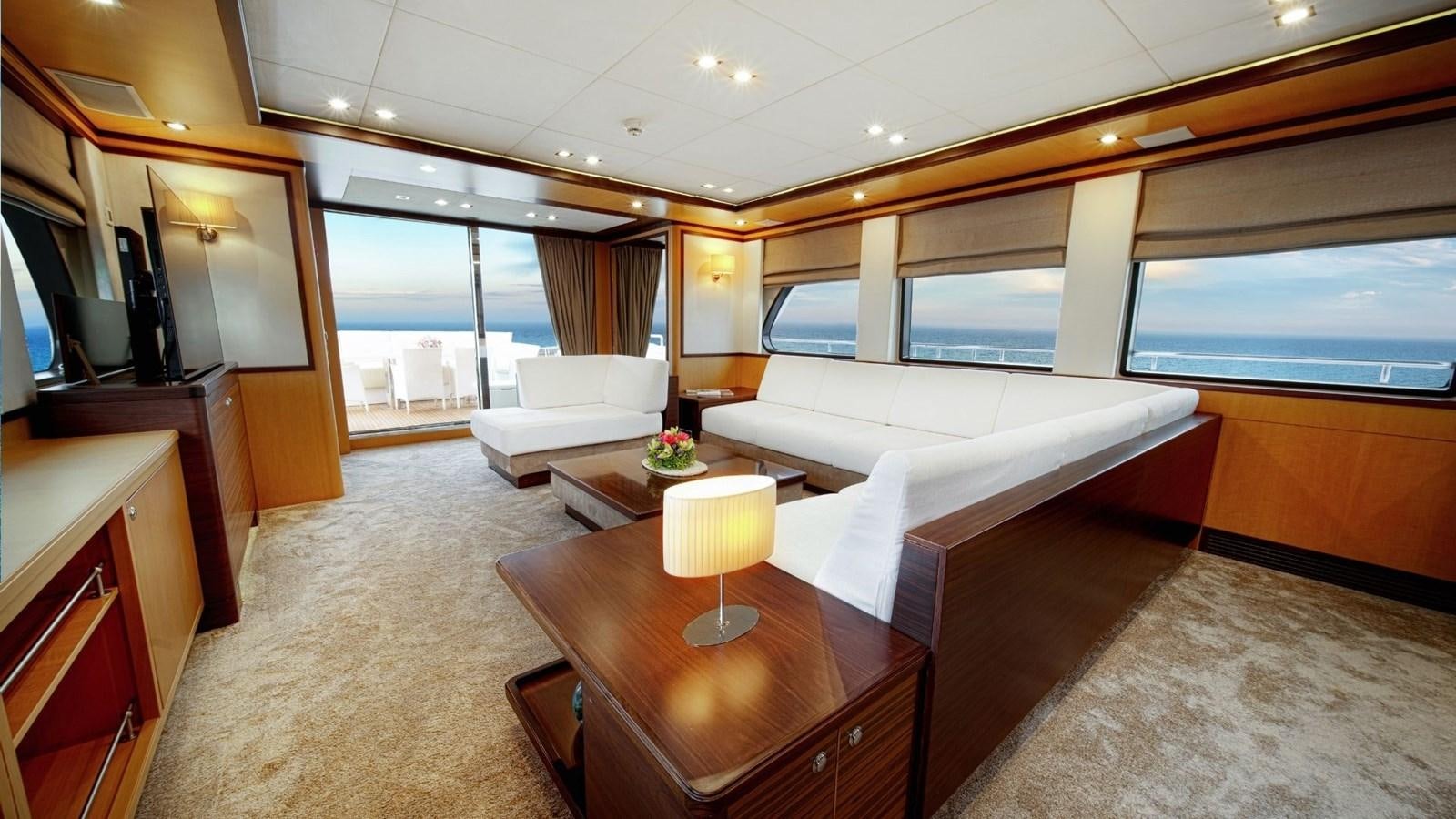 a living room with a large window aboard LARGO Yacht for Sale