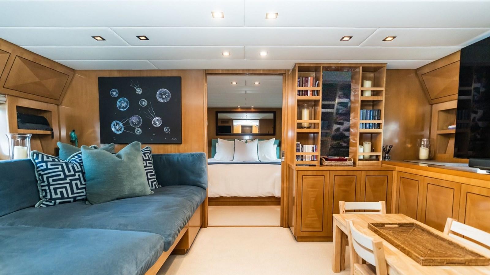 a room with a couch and a table aboard PALOMA Yacht for Sale