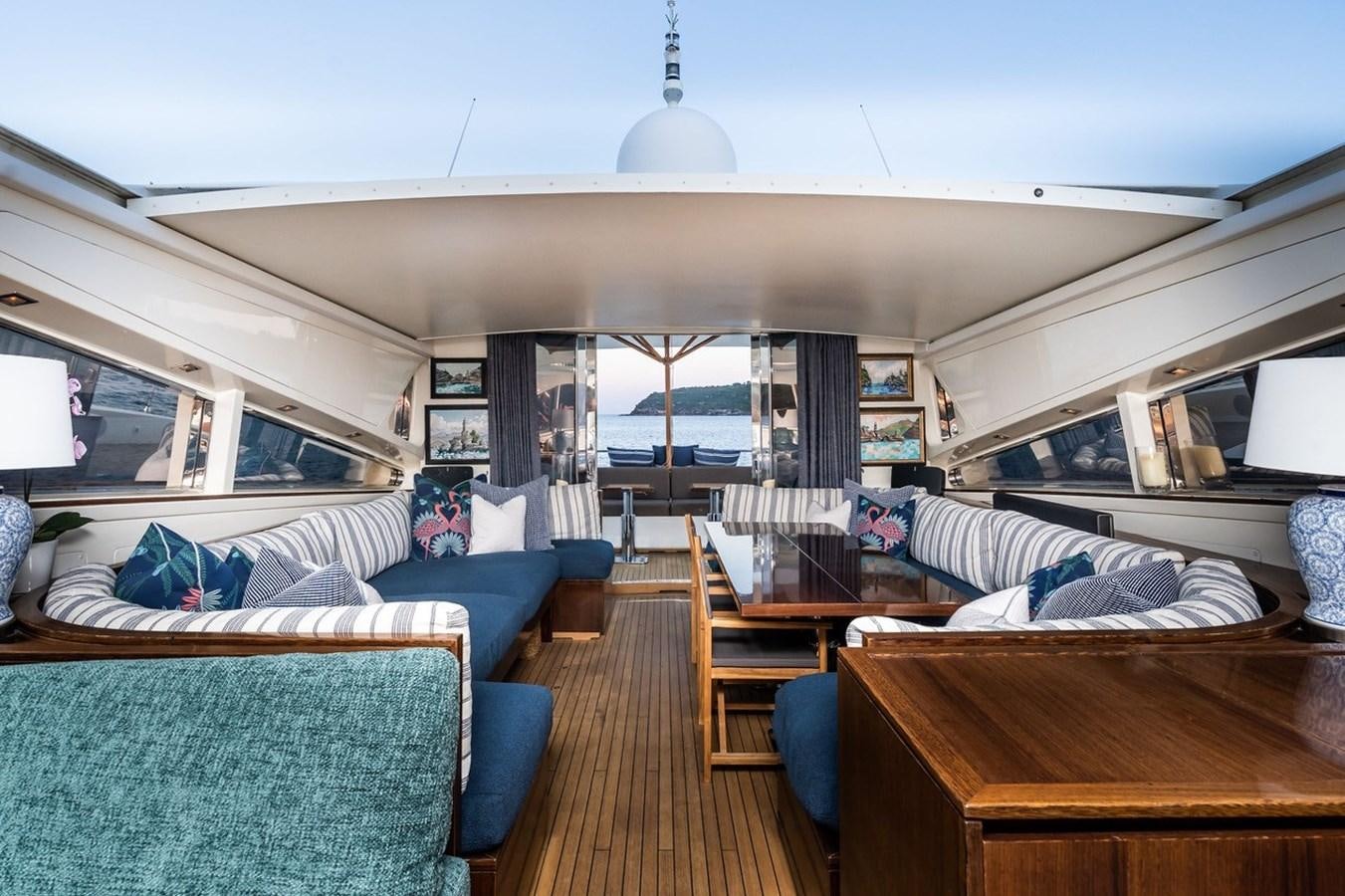 a room with a bed and a couch aboard PALOMA Yacht for Sale
