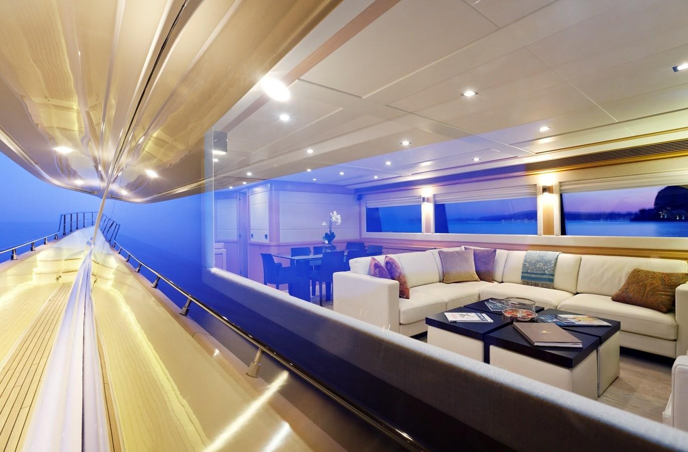 a room with a couch and a table aboard LA PAUSA Yacht for Sale