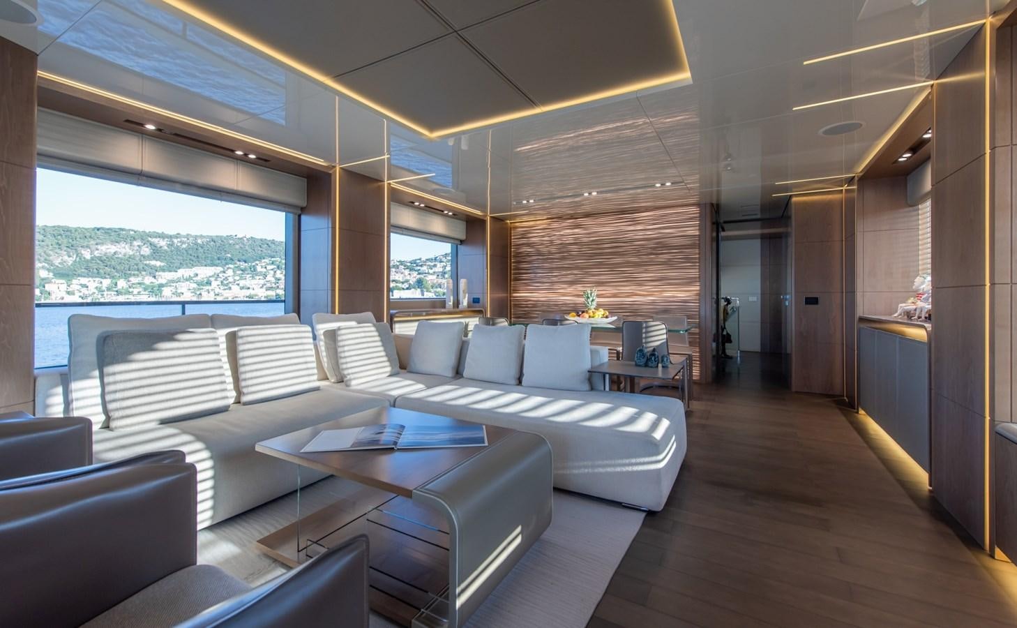a room with a couch and a table aboard 7 SECONDS Yacht for Sale