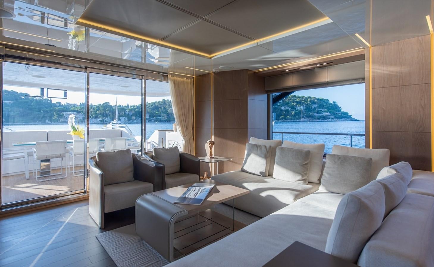 a living room with a large window aboard 7 SECONDS Yacht for Sale