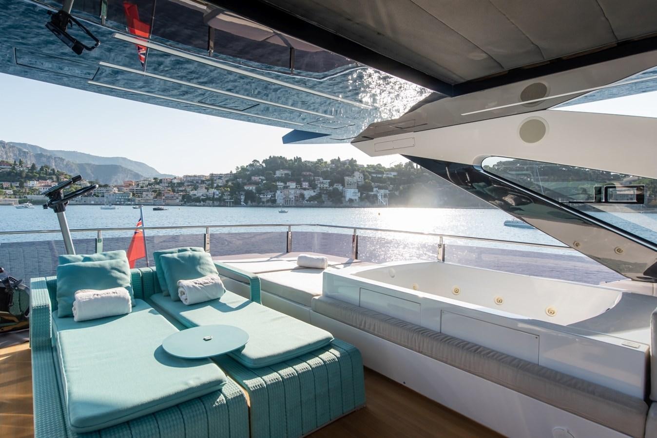 a room with a view of a city and water aboard 7 SECONDS Yacht for Sale