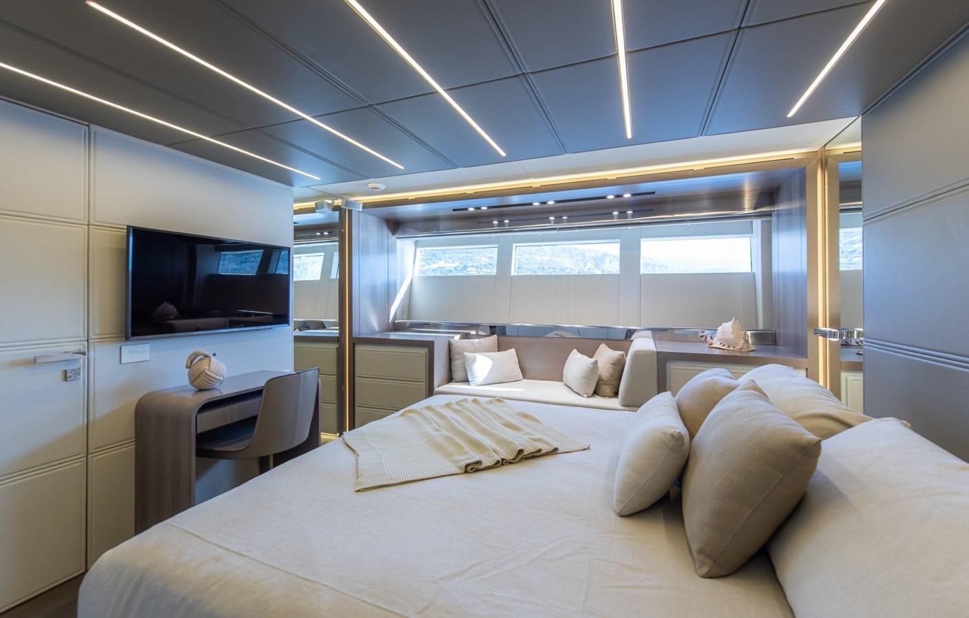 a large bed in a room aboard 7 SECONDS Yacht for Sale