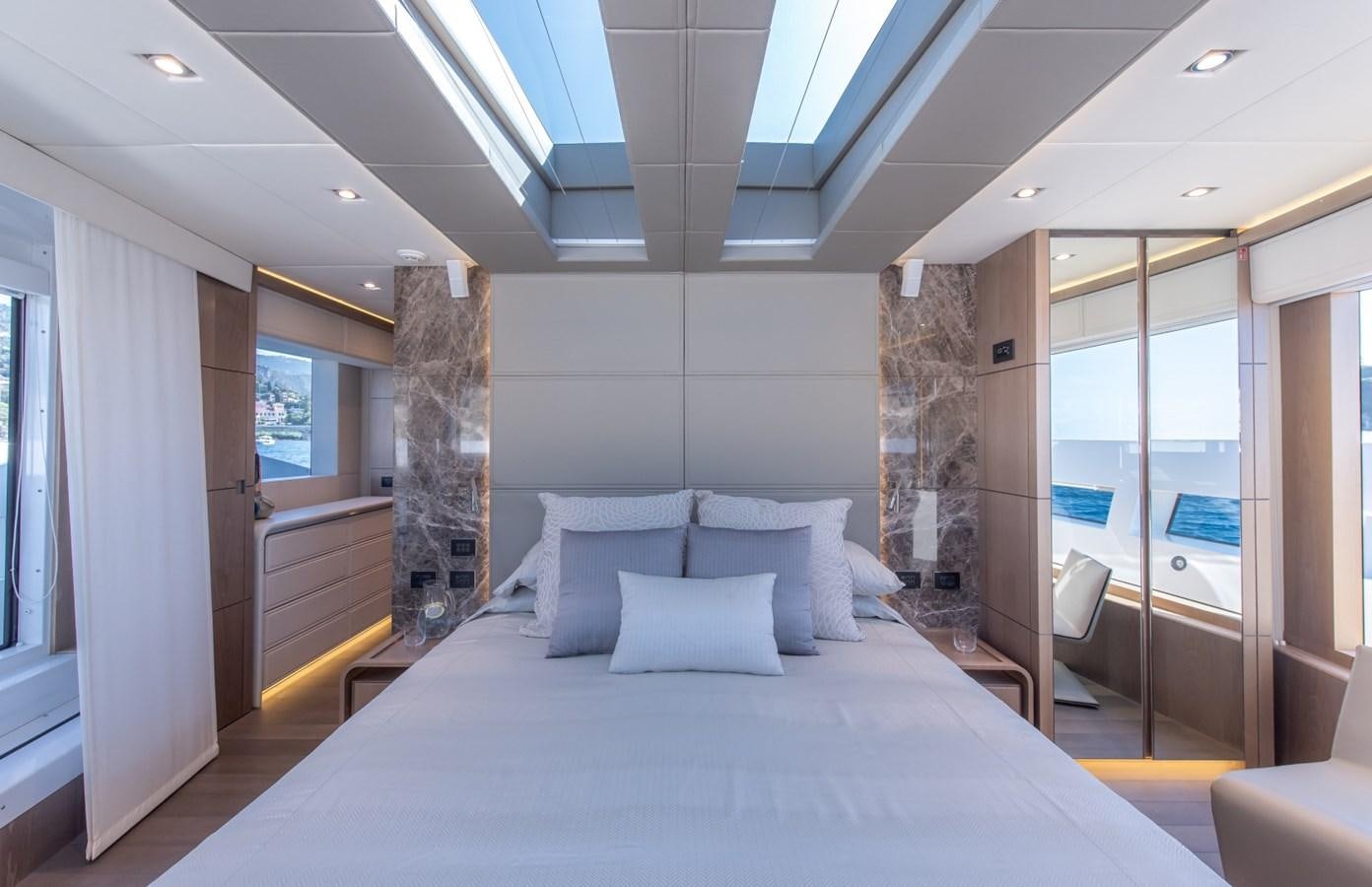 a bed in a room aboard 7 SECONDS Yacht for Sale