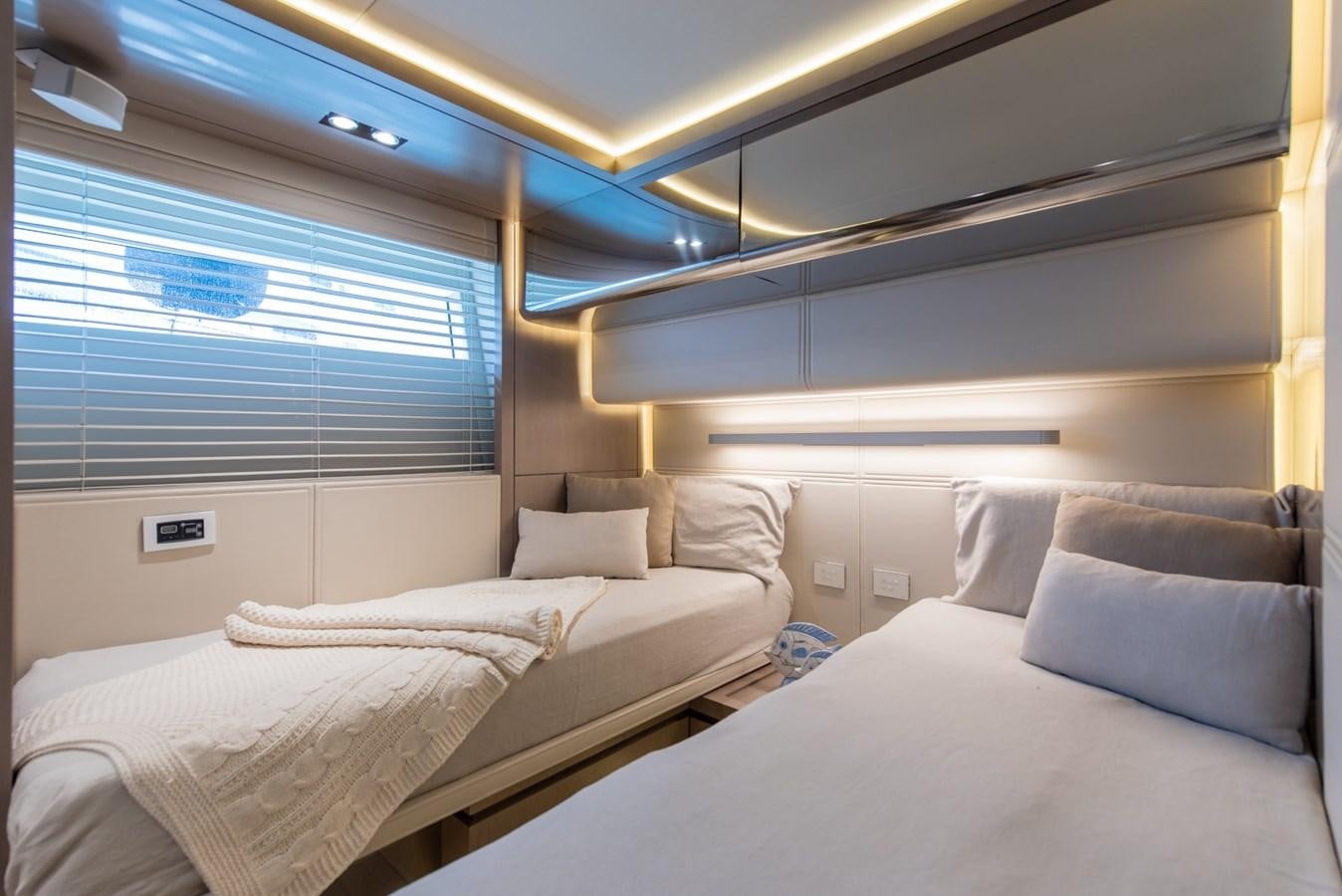 a room with two beds aboard 7 SECONDS Yacht for Sale