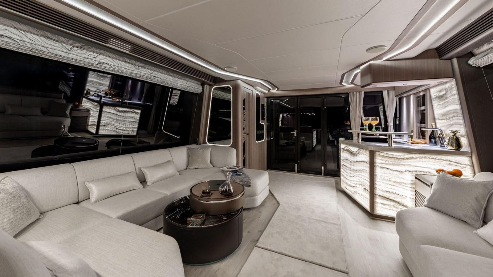 a living room with a large window aboard GALEON 800 FLY/1 Yacht for Sale