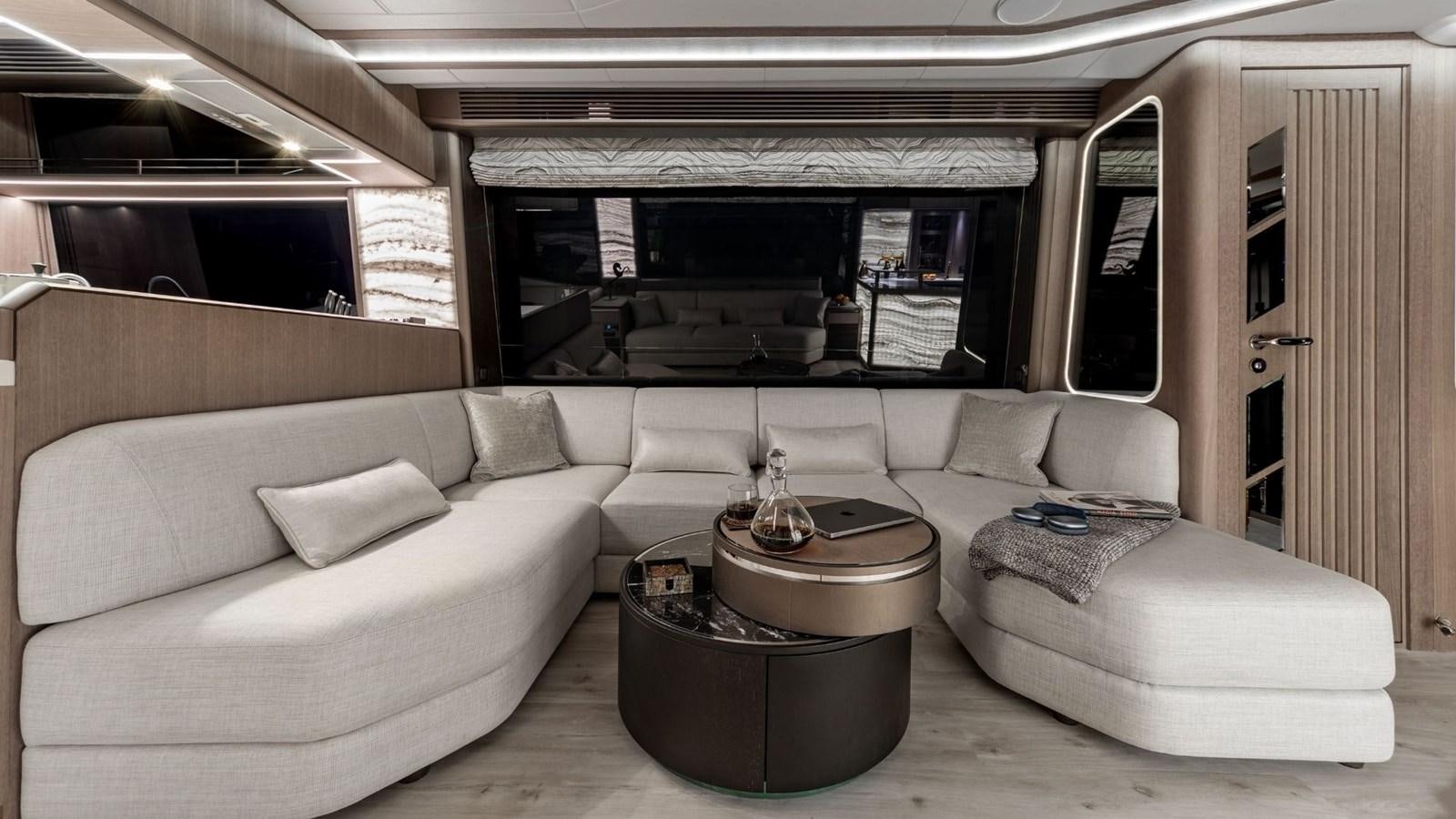 a living room with a couch and a coffee table aboard GALEON 800 FLY/1 Yacht for Sale