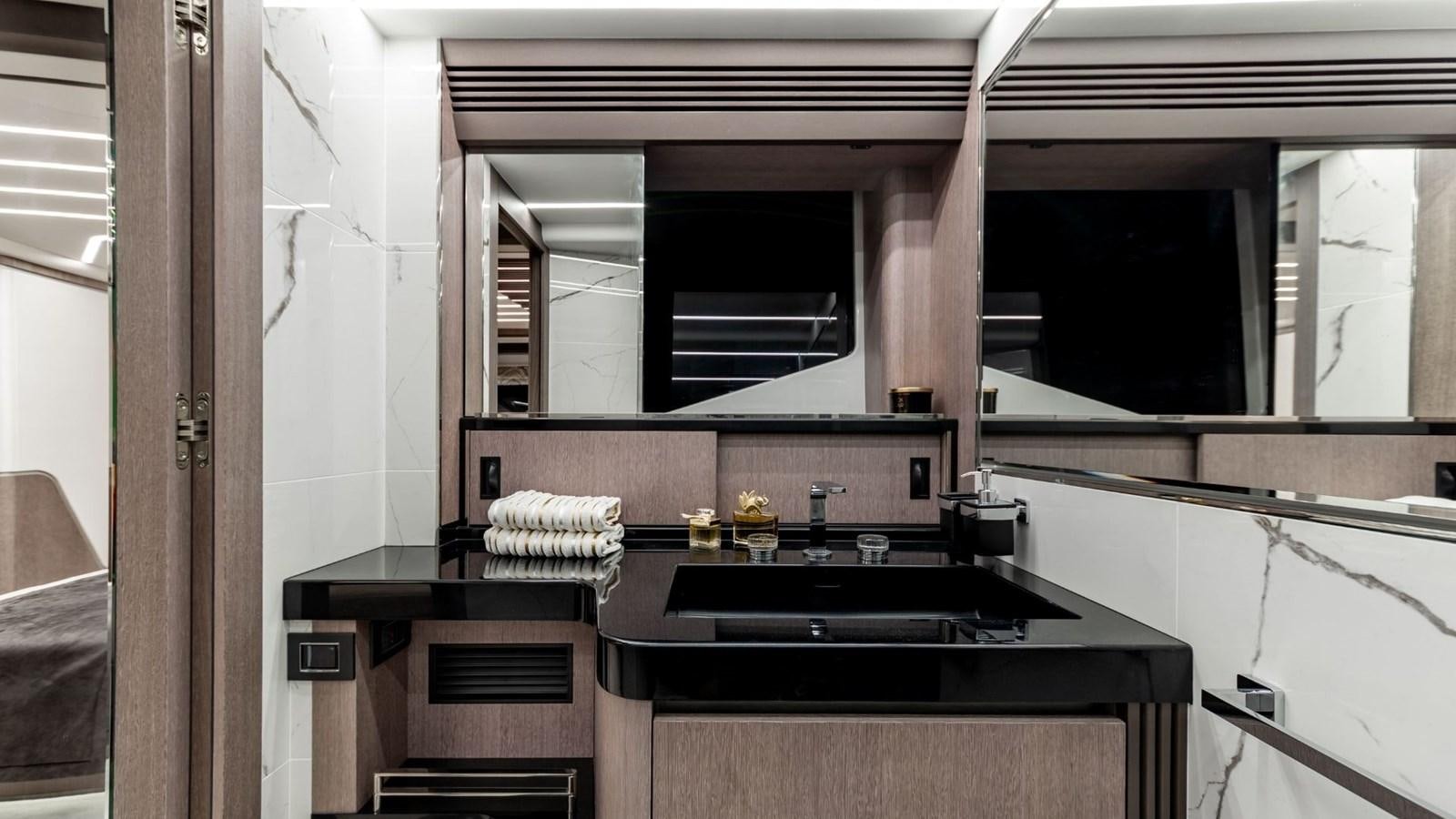 a kitchen with a sink and a mirror aboard GALEON 800 FLY/1 Yacht for Sale