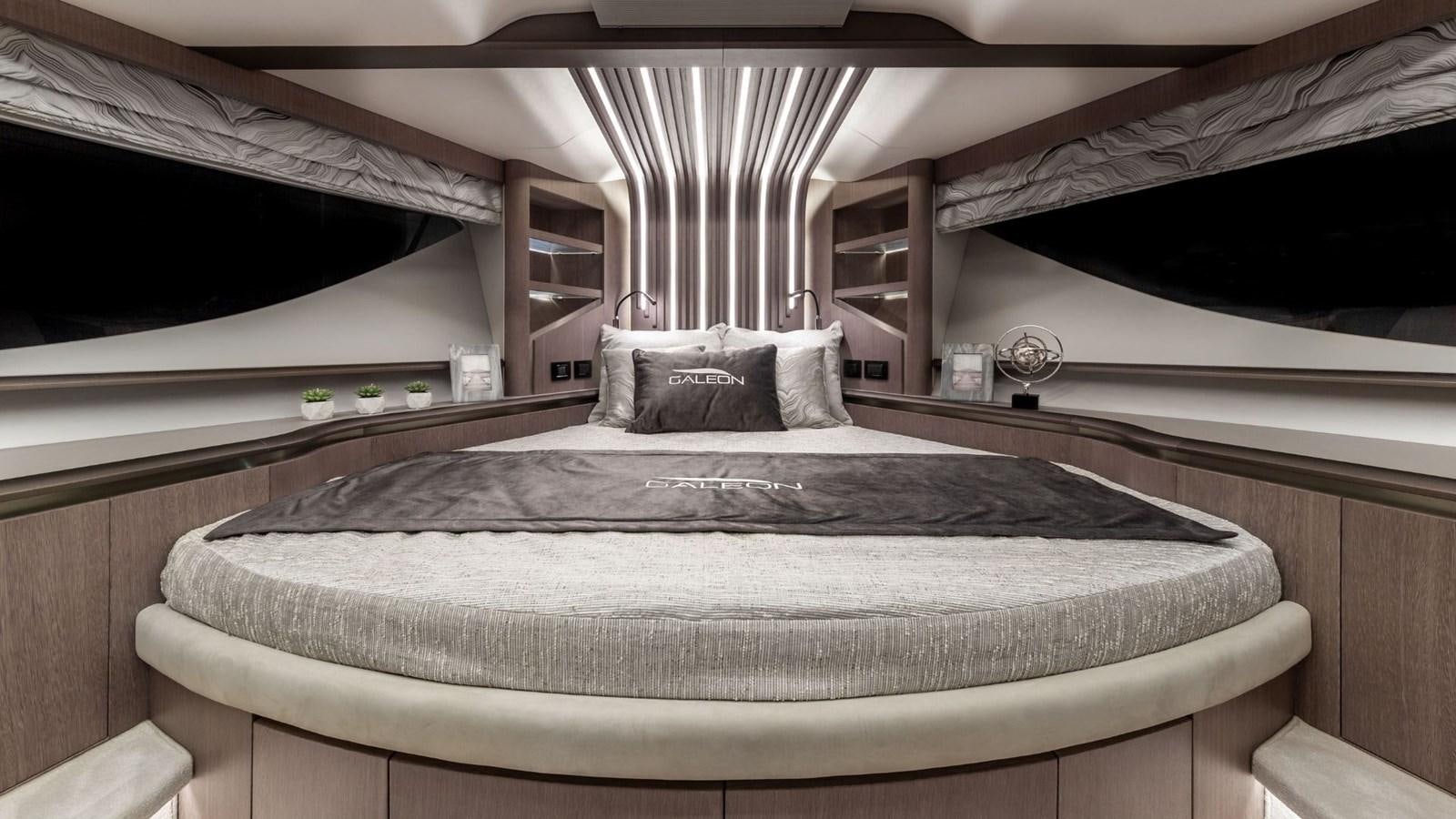 a bed with a white sheet aboard GALEON 800 FLY/1 Yacht for Sale