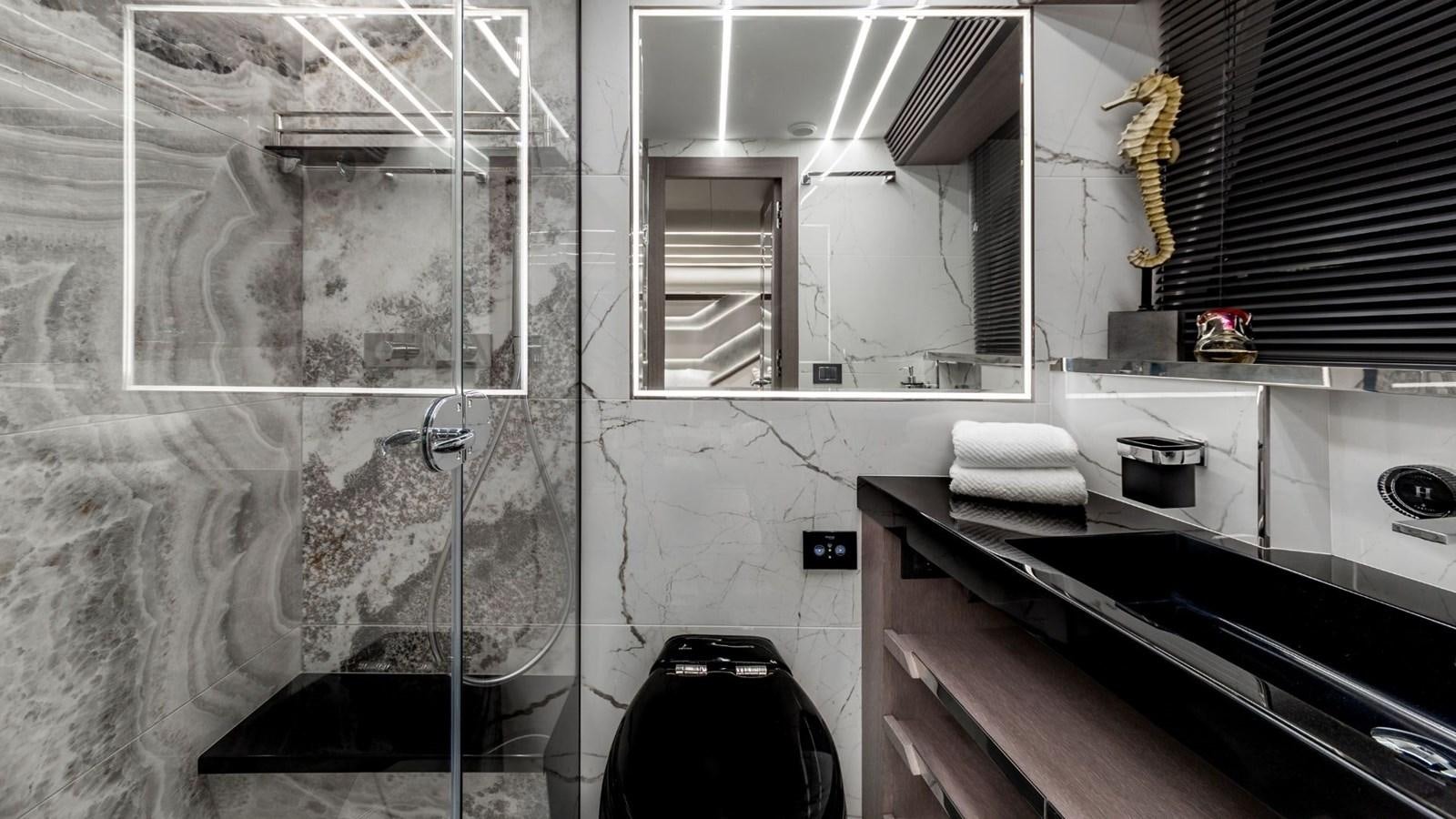 a bathroom with a large mirror aboard GALEON 800 FLY/1 Yacht for Sale