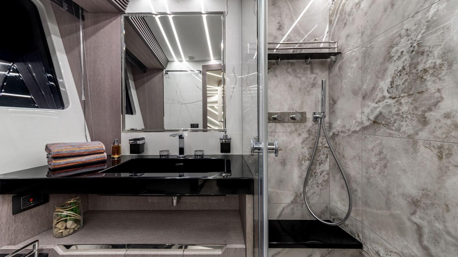 a kitchen with a sink and a large mirror aboard GALEON 800 FLY/1 Yacht for Sale