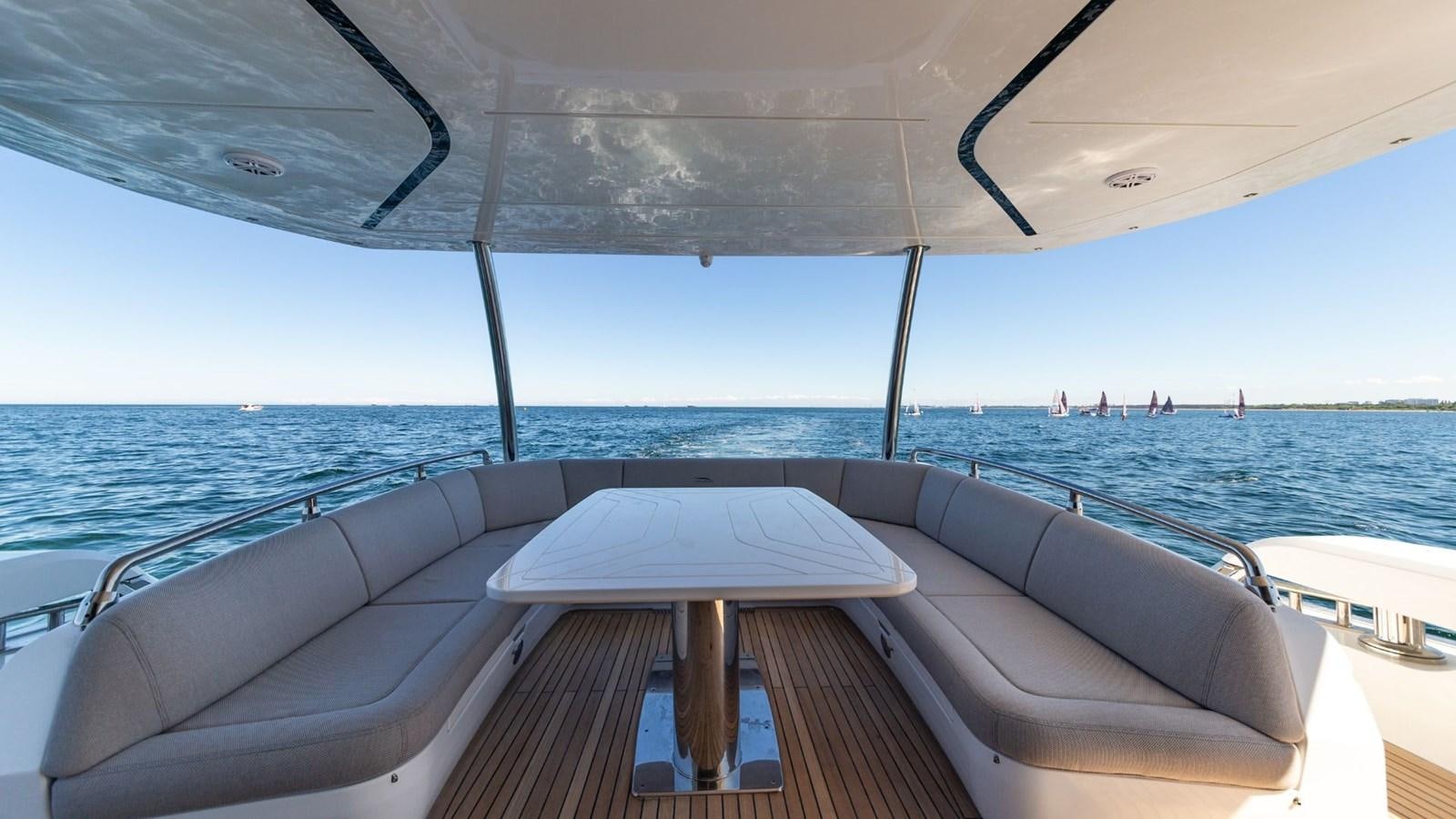 a table on a boat aboard GALEON 800 FLY/1 Yacht for Sale