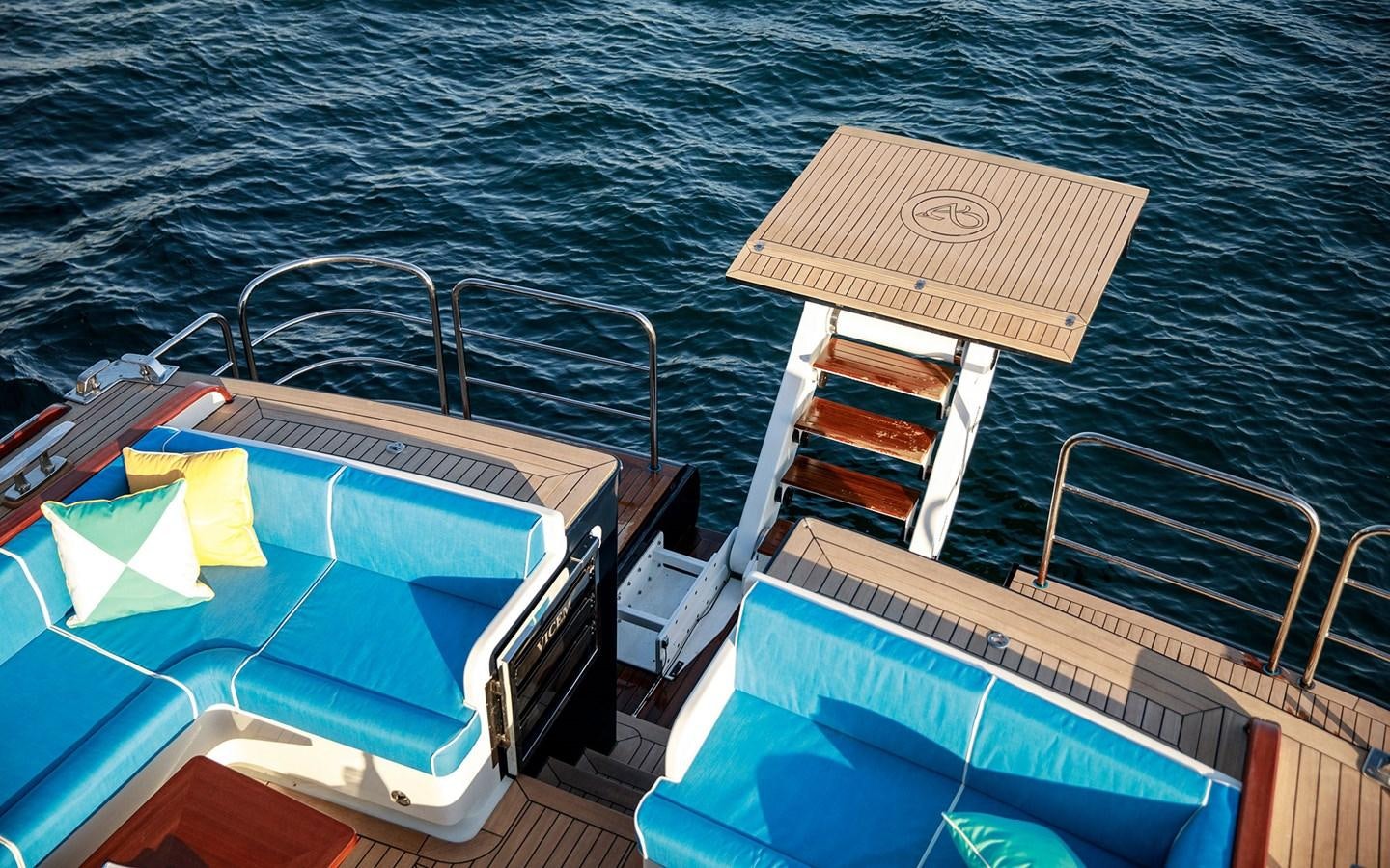 a boat with a stack of books on it aboard ALECTO Yacht for Sale