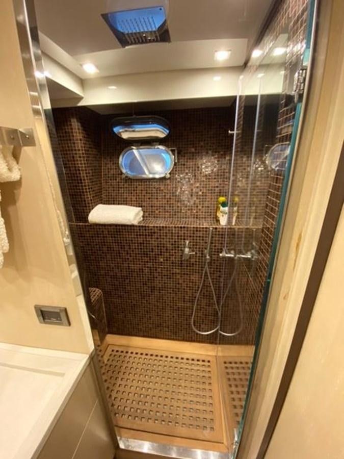 a shower unit with a sink and a mirror aboard @LAST Yacht for Sale