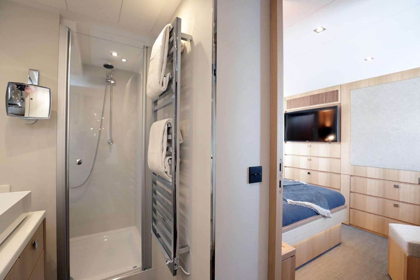 a bathroom with a shower unit and a sink aboard ARMONEE Yacht for Sale