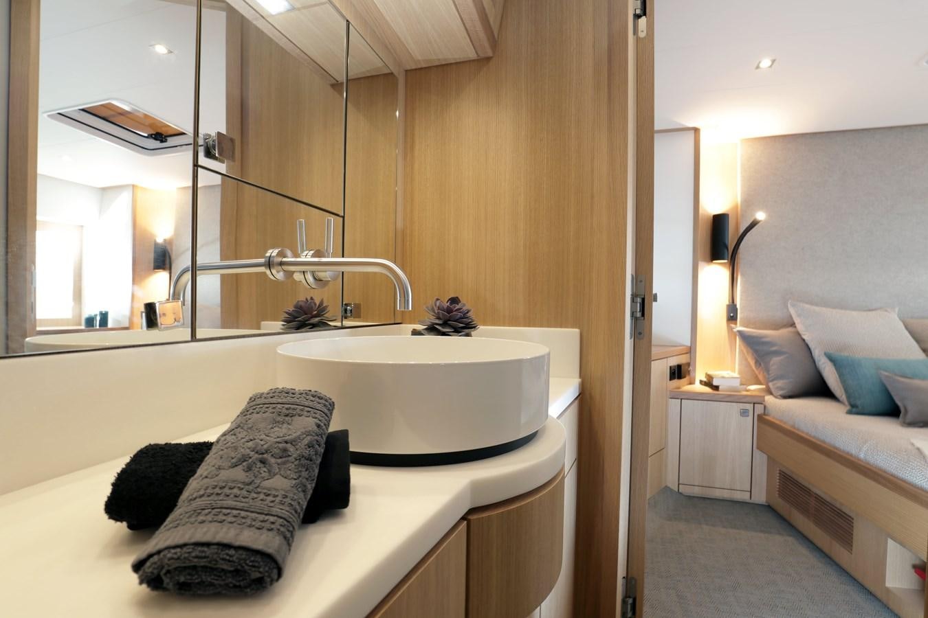 a bathroom with a large bathtub aboard ARMONEE Yacht for Sale