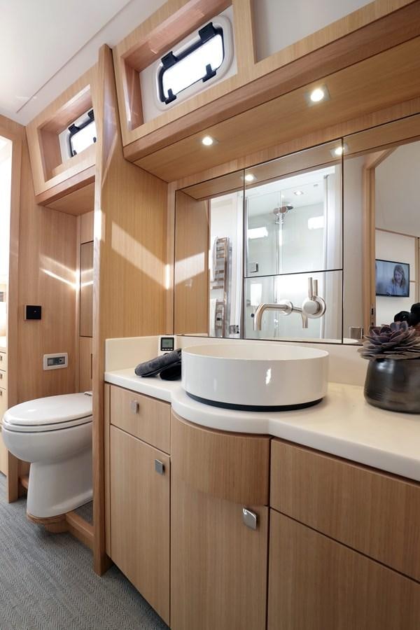 a bathroom with a sink and toilet aboard ARMONEE Yacht for Sale