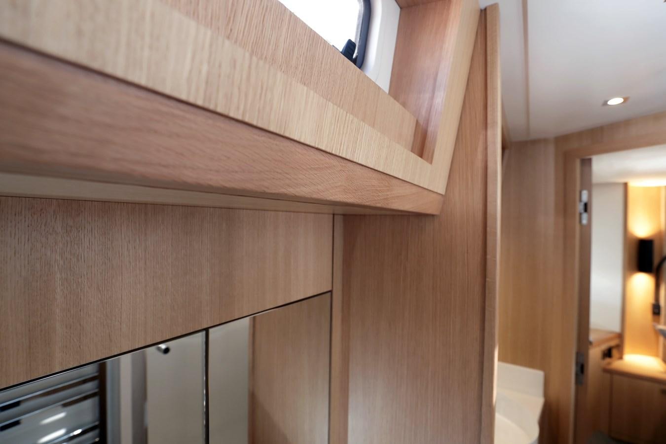 a room with wooden walls aboard ARMONEE Yacht for Sale