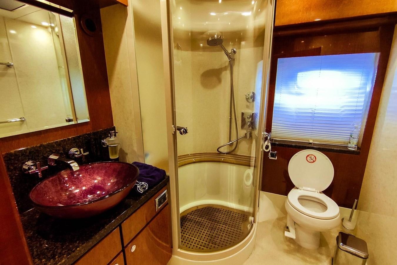 a bathroom with a sink toilet and bathtub aboard SEVEN Yacht for Sale